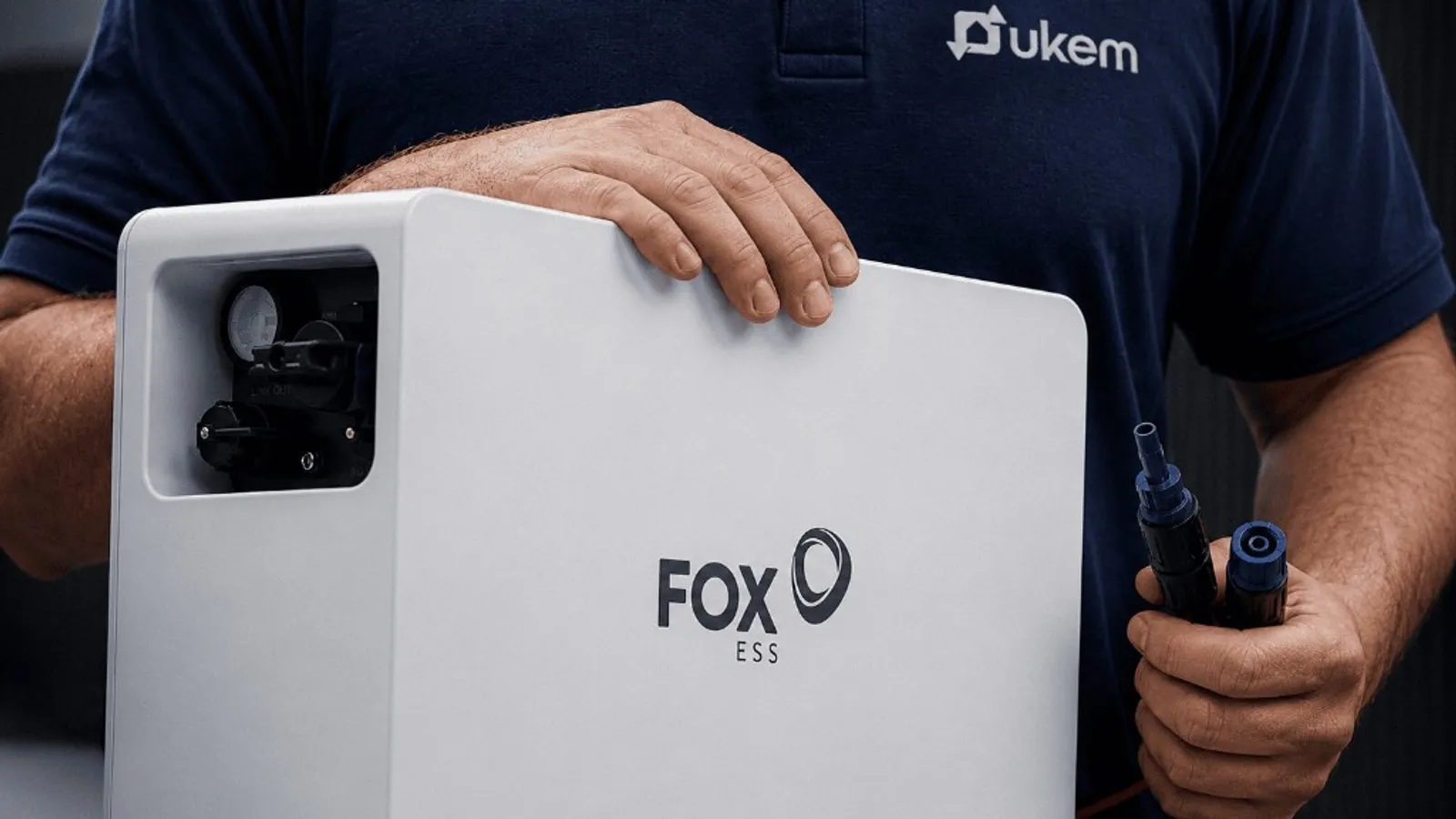 UKEM engineer connecting a Fox ESS EP12 home battery during a UK installation