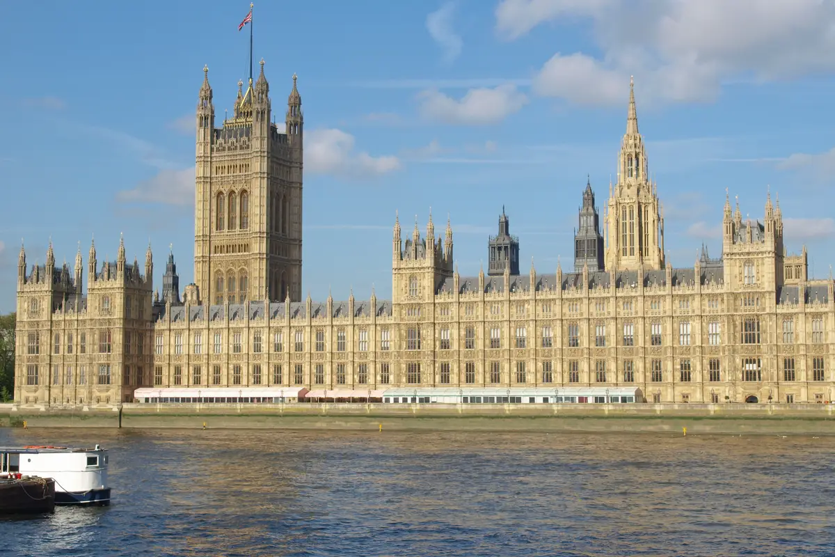 The Houses of Parliament in Westminster seen across the River Thames