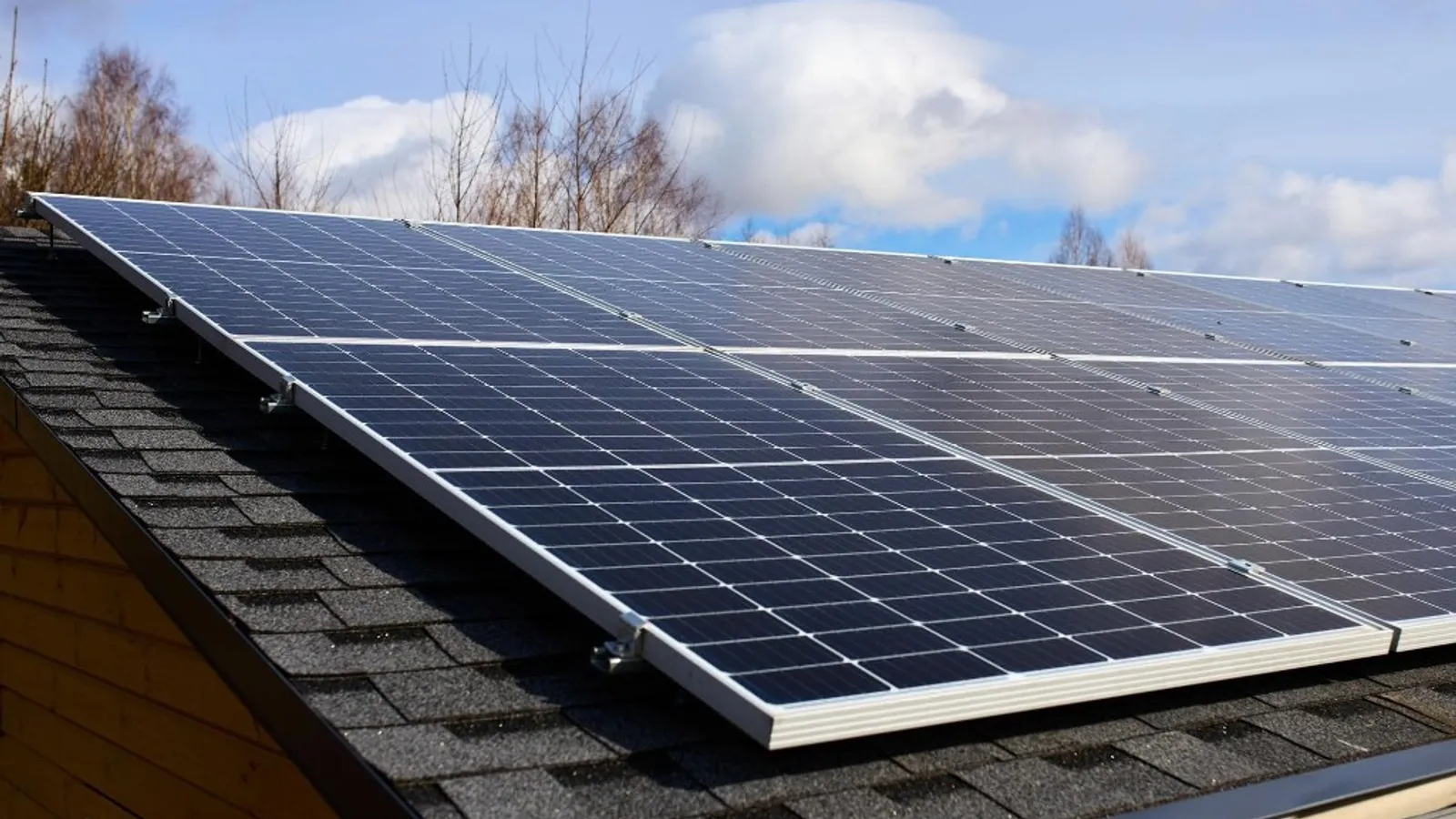 Solar panels installed on a UK pitched roof, the same technology now permitted as plug-in setups under 2026 regulations